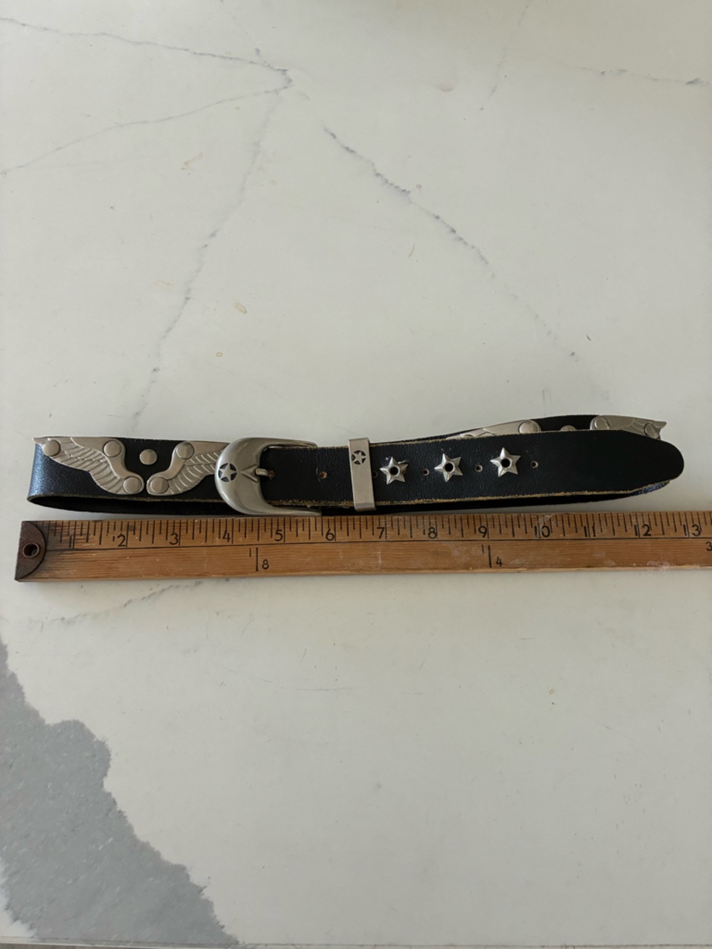 Super unique black leather belt, with angel wing.